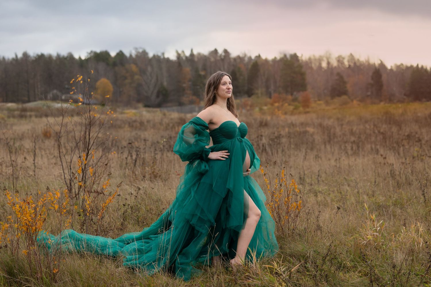 Gravidfotografering bland sanddyner